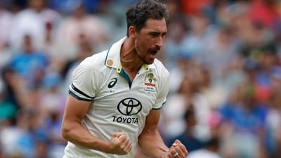 Australia's Mitchell Starc celebrates the dismissal of India's Virat Kohli during the day one of the second cricket test match between Australia and India at the Adelaide Oval in Adelaide, Australia, Friday, Dec. 6, 2024. (AP Photo/James Elsby) (AP) Australia's Mitchell Starc celebrates the dismissal of India's Virat Kohli during the day one of the second cricket test match between Australia and India at the Adelaide Oval in Adelaide, Australia, Friday, Dec. 6, 2024. (AP Photo/James Elsby) (AP)