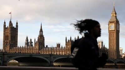 A jogger runs on the South Bank during cold weather, in London, Britain, November 20, 2024. (Reuters)