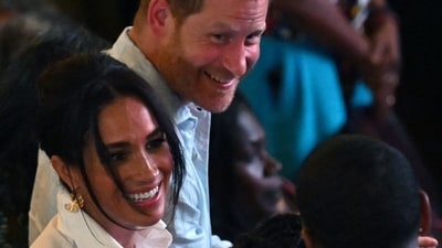 Britain's Prince Harry (back), Duke of Sussex, and his wife Meghan Markle (L) greet Colombia's vice-President Francia Marquez. (AFP) Britain's Prince Harry (back), Duke of Sussex, and his wife Meghan Markle (L) greet Colombia's vice-President Francia Marquez. (AFP)