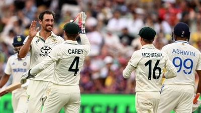 Australian bowler Mitchell Starc (C) celebrates dismissing Ravichandran Ashwin of India (R) on the first day of the second cricket Test match between Australia and India at the Adelaide Oval. (AFP) Australian bowler Mitchell Starc (C) celebrates dismissing Ravichandran Ashwin of India (R) on the first day of the second cricket Test match between Australia and India at the Adelaide Oval. (AFP)