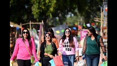 Even as the maximum temperature fell from 24.8°C on Thursday to 23.9°C on Friday, 1.5 degrees below normal, sunny weather kept smiles on the faces of visitors at Chandigarh National Crafts Mela on Friday. (Ravi Kumar/HT)