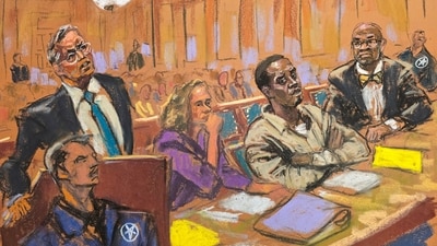 In this courtroom sketch, attorney Marc Agnifolo, left, speaks at the podium, as Alexandra Shapiro, Sean Diddy Combs, and attorney Tony Riccio, seated second left to right, listen during a hearing in federal court, Friday, Nov. 24, 2024, in New York. (Jane Rosenberg via AP) (AP) In this courtroom sketch, attorney Marc Agnifolo, left, speaks at the podium, as Alexandra Shapiro, Sean Diddy Combs, and attorney Tony Riccio, seated second left to right, listen during a hearing in federal court, Friday, Nov. 24, 2024, in New York. (Jane Rosenberg via AP) (AP)