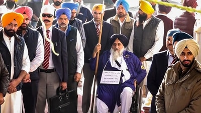 Shiromani Akali Dal leader Sukhbir Singh Badal serves the 'tankhah' (religious punishment) given to him by the Akal Takht at Takht Sri Kesgarh Sahib amid tight security, in Rupnagar district on Friday. (PTI) Shiromani Akali Dal leader Sukhbir Singh Badal serves the 'tankhah' (religious punishment) given to him by the Akal Takht at Takht Sri Kesgarh Sahib amid tight security, in Rupnagar district on Friday. (PTI)