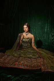 Outfit: Reynu Taandon
Mohanan radiates sophistication in a lush green corset lehenga from Reynu Taandon’s Alankaran collection, adorned with intricate Kalamkari work and Swarovski embellishments. Complementing the outfit, she wears a silver choker and armlet from Anana Outfit: Reynu Taandon
Mohanan radiates sophistication in a lush green corset lehenga from Reynu Taandon’s Alankaran collection, adorned with intricate Kalamkari work and Swarovski embellishments. Complementing the outfit, she wears a silver choker and armlet from Anana