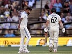 India's Mohammed Siraj reacts after taking the wicket of Australia's Travis Head (R) on the second day of the second cricket Test match. India's Mohammed Siraj reacts after taking the wicket of Australia's Travis Head (R) on the second day of the second cricket Test match.