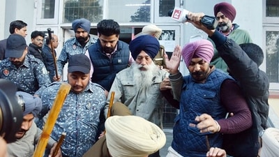 Anti-riot police officials produce Narain Singh Chaura, who opened fire at Sukhbir Singh Badal (Raminder Pal Singh ) Anti-riot police officials produce Narain Singh Chaura, who opened fire at Sukhbir Singh Badal (Raminder Pal Singh )