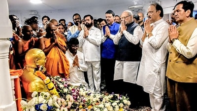 Maharashtra state governor CP Radhakrishnan offers prayers on the occasion of 69th death anniversary of BR Ambedkar, observed as Mahaparinirvan Diwas, in the presence of chief minister Devendra Fadnavis, deputy chief ministers Eknath Shinde, Ajit Pawar and others in Mumbai on Friday. (ANI)