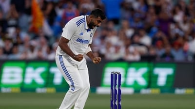 The Australian innings began with Jasprit Bumrah removing opener Usman Khawaja (13). (AP) The Australian innings began with Jasprit Bumrah removing opener Usman Khawaja (13). (AP)