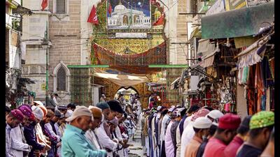 Ajmer: Muslim devotees offer prayers outside the Ajmer Sharif Dargah, Shrine of Moinuddin Chishti, in Ajmer, Rajasthan, Friday, Dec. 6, 2024. (PTI Photo) (PTI)