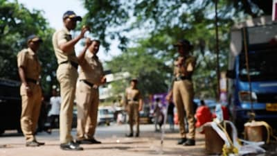 Police officers stand at the crime scene next to markings of the gunshots where Nationalist Congress Party (NCP) politician Baba Siddique was shot dead in Mumbai, India, October 13, 2024. (REUTERS)