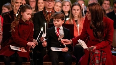 Britain's Princess Charlotte, from left, Prince Louis and Britain's Kate, the Princess of Wales, during the Together At Christmas carol service at Westminster Abbey, in London, Friday, Dec. 6, 2024. (Aaron Chown/Pool Photo via AP) (AP) Britain's Princess Charlotte, from left, Prince Louis and Britain's Kate, the Princess of Wales, during the Together At Christmas carol service at Westminster Abbey, in London, Friday, Dec. 6, 2024. (Aaron Chown/Pool Photo via AP) (AP)