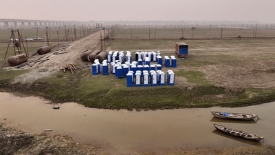Portable toilets are kept on the banks of the Ganges river before installation, The estimated gathering is around 400 million people, marking Maha Kumbh Mela as one of the largest religious festivals.&nbsp; ( (AP Photo/Rajesh Kumar Singh))
