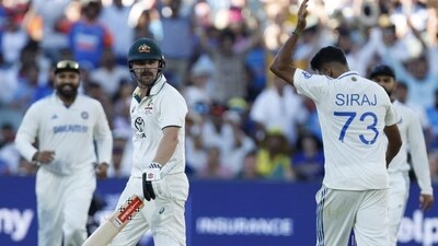 Mohammed Siraj, right, gestures at Travis Head after his dismissal on Day 2 of the second Test, in Adelaide on Saturday. (AP) Mohammed Siraj, right, gestures at Travis Head after his dismissal on Day 2 of the second Test, in Adelaide on Saturday. (AP)