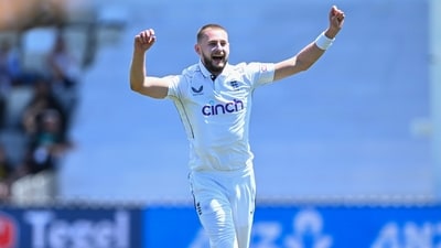 England's Gus Atkinson celebrates after taking a hat trick during play on day two (AP) England's Gus Atkinson celebrates after taking a hat trick during play on day two (AP)