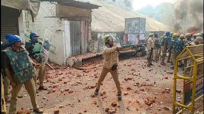 Police try to control the situation amid violence during a second survey of the Jama Masjid, claimed to be originally the site of an ancient Hindu temple, in Sambhal, last month. (PTI) Police try to control the situation amid violence during a second survey of the Jama Masjid, claimed to be originally the site of an ancient Hindu temple, in Sambhal, last month. (PTI)
