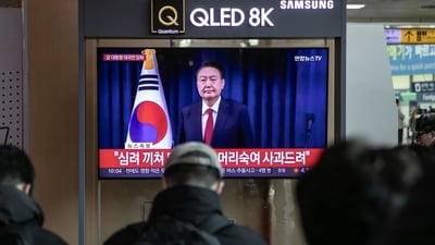 A television screen shows a live footage of South Korean President Yoon Suk Yeol delivering a speech, at Seoul Station in Seoul, South Korea (Bloomberg) A television screen shows a live footage of South Korean President Yoon Suk Yeol delivering a speech, at Seoul Station in Seoul, South Korea (Bloomberg)