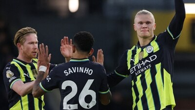Manchester City's Erling Haaland celebrates scoring their first goal with Manchester City's Kevin De Bruyne and Savinho Action Images via Reuters/Paul Childs (Action Images via Reuters)