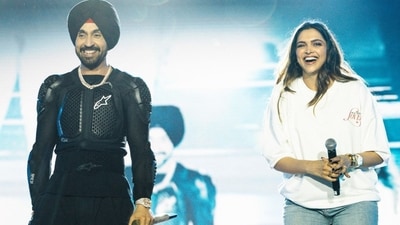 Diljit Dosanjh and Deepika Padukone on stage at his Bengaluru concert. Diljit Dosanjh and Deepika Padukone on stage at his Bengaluru concert.