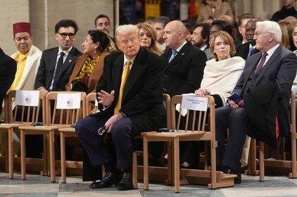President-elect Donald Trump sits in Notre Dame Cathedral as France's iconic cathedral is formally reopening its doors for the first time since a devastating fire nearly destroyed the 861-year-old landmark in 2019, Saturday, Dec. 7, 2024 in Paris. (AP)