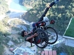 In Rishikesh, a wheelchair-bound man conquered India's highest bungee jump at 117m.