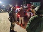 Security personnel check vehicles in a sensitive area of Manipur on December 7 (PTI Photo) Security personnel check vehicles in a sensitive area of Manipur on December 7 (PTI Photo)