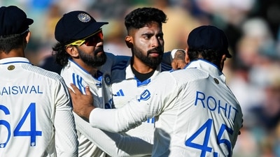 India's Mohammed Siraj, captain Rohit Sharma and teammates celebrate the dismissal of Australia's Travis Head during Day 2 of the second Test (BCCI- X)