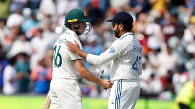 Rohit Sharma shakes hands with rookie Australia opener Nathan McSweeney after the loss at the Adelaide Oval. (AP) Rohit Sharma shakes hands with rookie Australia opener Nathan McSweeney after the loss at the Adelaide Oval. (AP)