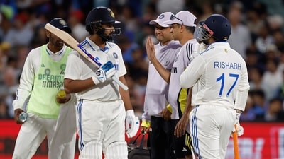 Members of the team support staff attend to India's captain Rohit Sharma. (AP Photo/James Elsby) (AP) Members of the team support staff attend to India's captain Rohit Sharma. (AP Photo/James Elsby) (AP)