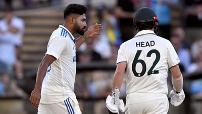 Indian bowler Mohammed Siraj (L) gestures to Australian batsman Travis Head (R) on the second day of the second Test (AFP) Indian bowler Mohammed Siraj (L) gestures to Australian batsman Travis Head (R) on the second day of the second Test (AFP)