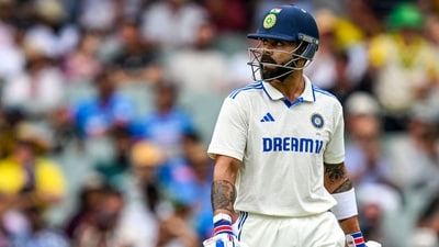 India's Virat Kohli walks back to the pavilion after his dismissal on the first day of the second Test cricket match between Australia and India at the Adelaide Oval in Adelaide (AFP) India's Virat Kohli walks back to the pavilion after his dismissal on the first day of the second Test cricket match between Australia and India at the Adelaide Oval in Adelaide (AFP)
