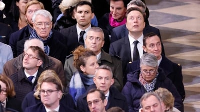 Elon Musk looks up during a ceremony to mark the re-opening of the landmark Notre-Dame Cathedral in central Paris. (AFP) Elon Musk looks up during a ceremony to mark the re-opening of the landmark Notre-Dame Cathedral in central Paris. (AFP)