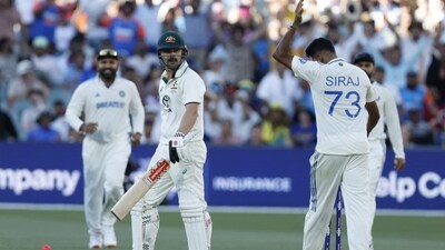Mohammed Siraj, right, gestures at Travis Head after his dismissal on Day 2 of the second Test, in Adelaide on Saturday (HT_PRINT) Mohammed Siraj, right, gestures at Travis Head after his dismissal on Day 2 of the second Test, in Adelaide on Saturday (HT_PRINT)