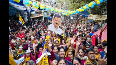New Delhi: AAP National Convener Arvind Kejriwal's supporters during his ‘padyatra’ in Karol Bagh area ahead of the Delhi Assembly elections, in New Delhi. (PTI Photo) (PTI) New Delhi: AAP National Convener Arvind Kejriwal's supporters during his ‘padyatra’ in Karol Bagh area ahead of the Delhi Assembly elections, in New Delhi. (PTI Photo) (PTI)