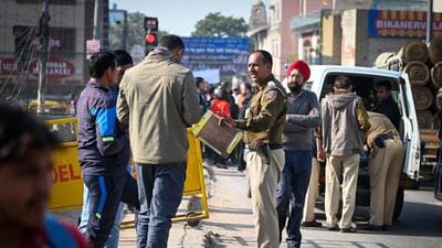 Police at the shooting site at Vishwas Nagar in New Delhi on Saturday. (Sanchit Khanna/HT Photo) Police at the shooting site at Vishwas Nagar in New Delhi on Saturday. (Sanchit Khanna/HT Photo)