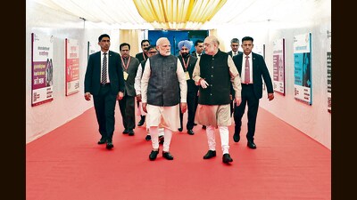 Prime Minister Narendra Modi with Union home minister Amit Shah visits an exhibition to see a demonstration on the implementation of three new criminal laws, in Chandigarh on December 3. (PTI) Prime Minister Narendra Modi with Union home minister Amit Shah visits an exhibition to see a demonstration on the implementation of three new criminal laws, in Chandigarh on December 3. (PTI)