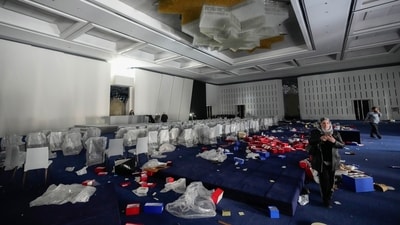 People also ransacked a conference room, and stole other ornaments from the palace.&nbsp;&nbsp; (AP)