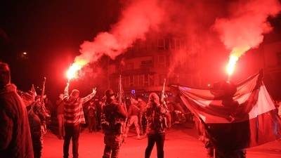 Rebel forces shoot in the air as they celebrate in the central Syrian city of Homs. (AFP) Rebel forces shoot in the air as they celebrate in the central Syrian city of Homs. (AFP)