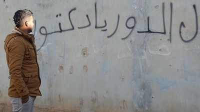 At the age of 14, Mouawiya Syasneh spray-painted a wall with phrases that would have serious repercussions.