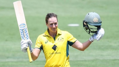 Ellyse Perry celebrates her century vs India at the Allan Border Field, Brisbane. (Australian Associated Press) Ellyse Perry celebrates her century vs India at the Allan Border Field, Brisbane. (Australian Associated Press)