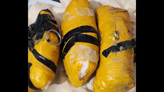 The recovered consignment was allegedly sent by Pakistani smugglers through drone. (HT Photo)