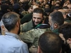 Syrian rebel leader Abu Mohammed al-Jolani (C), before his address at the capital's landmark Umayyad Mosque. Syrian rebel leader Abu Mohammed al-Jolani (C), before his address at the capital's landmark Umayyad Mosque.