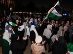 Syrian-Americans and supporters celebrate after Syrian rebels announced that they had ousted Syrian President Bashar al-Assad in Syria, in Dearborn, Michigan, U.S. December 8, 2024.    REUTERS