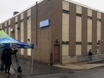 Members of the media gather outside of Altoona Police Department where a man with a gun thought to be similar to the one used in the killing of UnitedHealthcare CEO Brian Thompson has been taken into police custody. Members of the media gather outside of Altoona Police Department where a man with a gun thought to be similar to the one used in the killing of UnitedHealthcare CEO Brian Thompson has been taken into police custody.