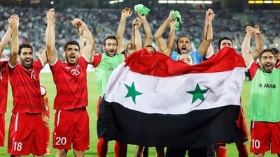 The Syrian football association changed the national team's uniform and insignia from red to green in response to rebels overthrowing President Bashar al-Assad's government. The Syrian football association changed the national team's uniform and insignia from red to green in response to rebels overthrowing President Bashar al-Assad's government.