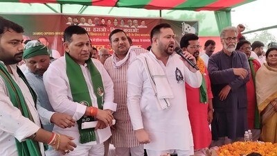 FILE: Former deputy chief minister Tejaswi Yadav addressing with CPI-ML national general secretary Dipankar Bhattacharya people at Mopti Bazar (Bhojpur district) to garner support of INDIA bloc candidate for Tarari bypoll in Ara. (Hindustan Times)