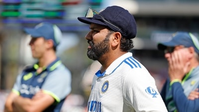 India's captain Rohit Sharma reacts during the presentation ceremony of the second cricket test match between Australia and India at the Adelaide Oval in Adelaide, Australia, Sunday, Dec. 8 (AP)