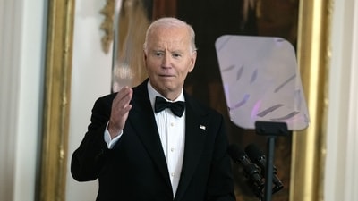 US President Joe Biden speaks during a ceremony in the East Room of the White House in Washington, DC, US, on December  8. (Bloomberg) (Bloomberg)