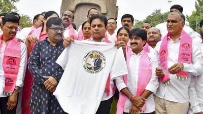 BRS working president K.T. Rama Rao, centre, with other party legislators during a protest alleging an "unholy nexus" between Chief Minister Revanth Reddy and industrialist Gautam Adani, ahead of the start of winter session of the Telangana Assembly, in Hyderabad, on Monday (PTI) BRS working president K.T. Rama Rao, centre, with other party legislators during a protest alleging an "unholy nexus" between Chief Minister Revanth Reddy and industrialist Gautam Adani, ahead of the start of winter session of the Telangana Assembly, in Hyderabad, on Monday (PTI)