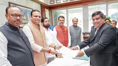 Bharatiya Janata Party (BJP) leader Rahul Narwekar filing his nomination for Speaker of Maharashtra Legislative Assembly in presence of state chief minister Devendra Fadnavis, Dy CMs Ajit Pawar and Eknath Shinde, BJP state chief Chandrashekhar Bawankule, in Mumbai on Sunday. (Dev_Fadnavis/X) Bharatiya Janata Party (BJP) leader Rahul Narwekar filing his nomination for Speaker of Maharashtra Legislative Assembly in presence of state chief minister Devendra Fadnavis, Dy CMs Ajit Pawar and Eknath Shinde, BJP state chief Chandrashekhar Bawankule, in Mumbai on Sunday. (Dev_Fadnavis/X)