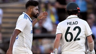 Indian bowler Mohammed Siraj (L) gestures to Australian batsman Travis Head (R). (Photo by William WEST / AFP) (AFP) Indian bowler Mohammed Siraj (L) gestures to Australian batsman Travis Head (R). (Photo by William WEST / AFP) (AFP)